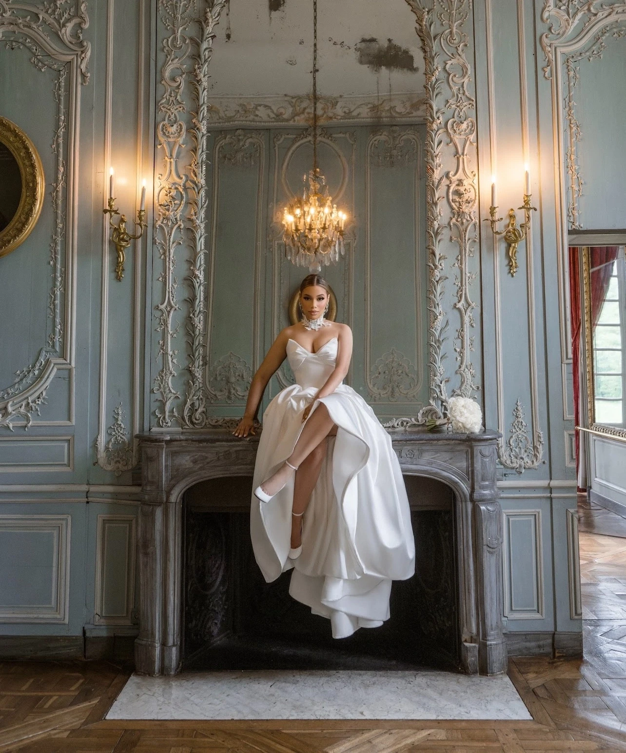 Сouple wearing a white gown and a black suit