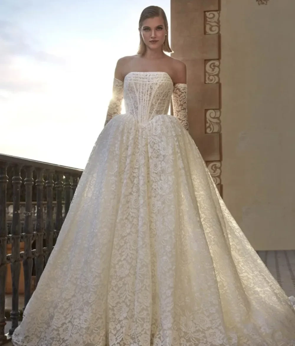 Model wearing a gown by Privee by Pronovias